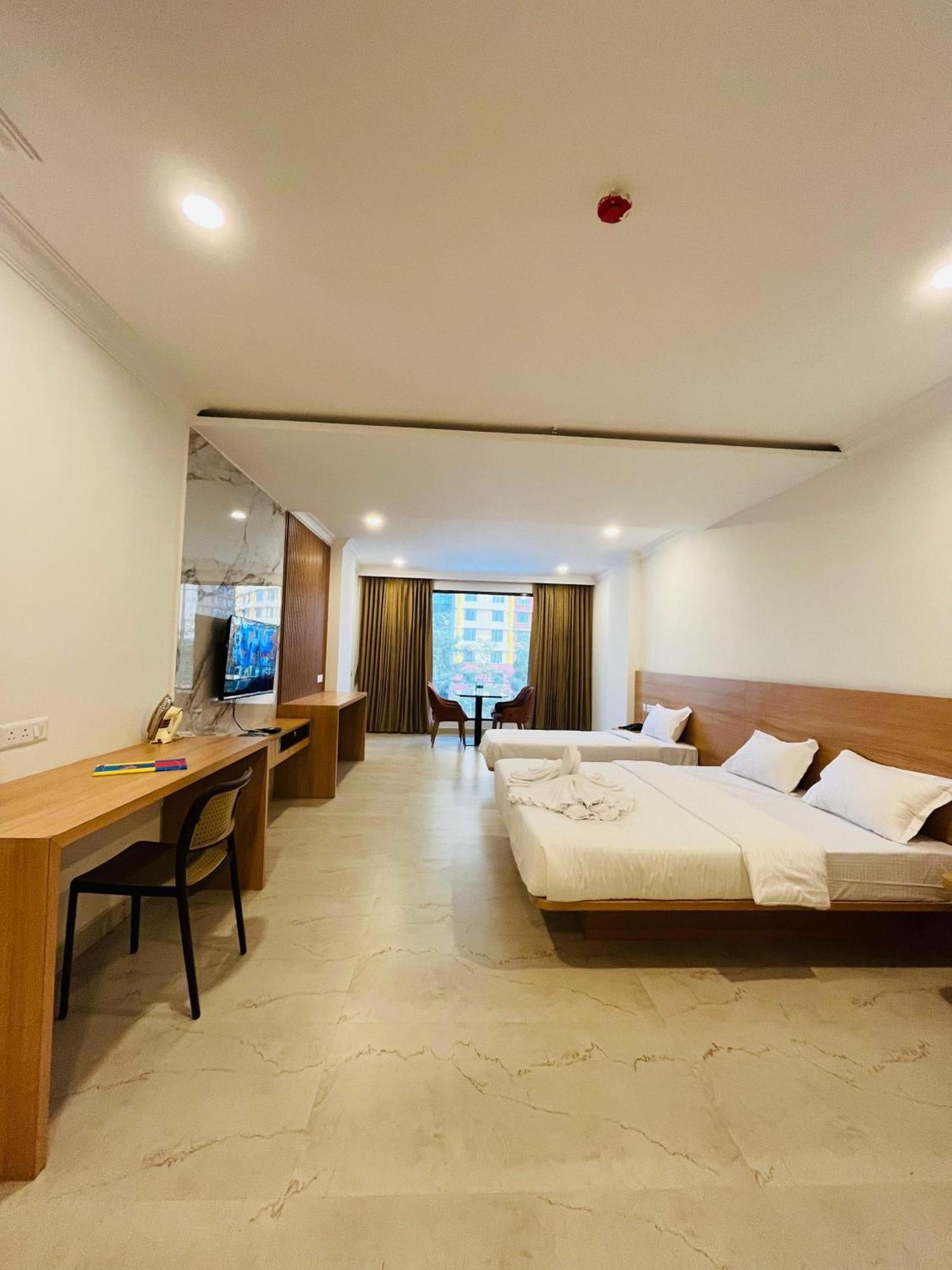 Richmond Inn And Suites Manipal Bilik gambar